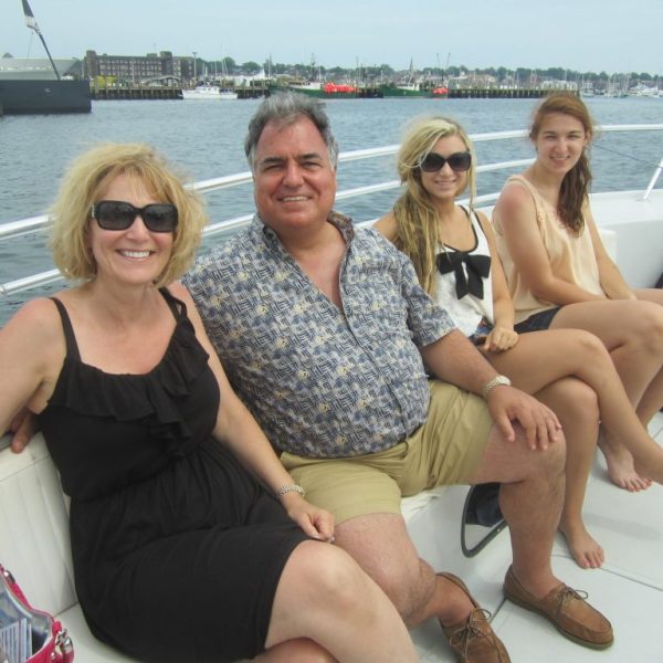 a group of people sitting posing for the camera